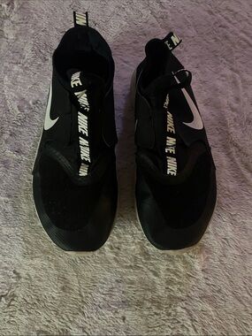 Nike Black Slip-On Athletic Shoes with White Swoosh Accent